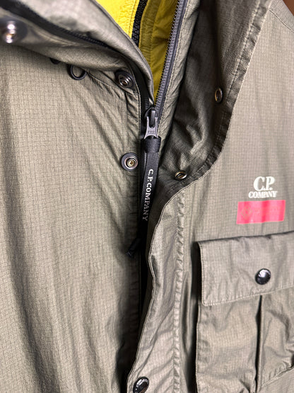 AW25 C.P. COMPANY GORE-G TYPE “LA MILLE” JACKET in Olive Green & Neon Yellow