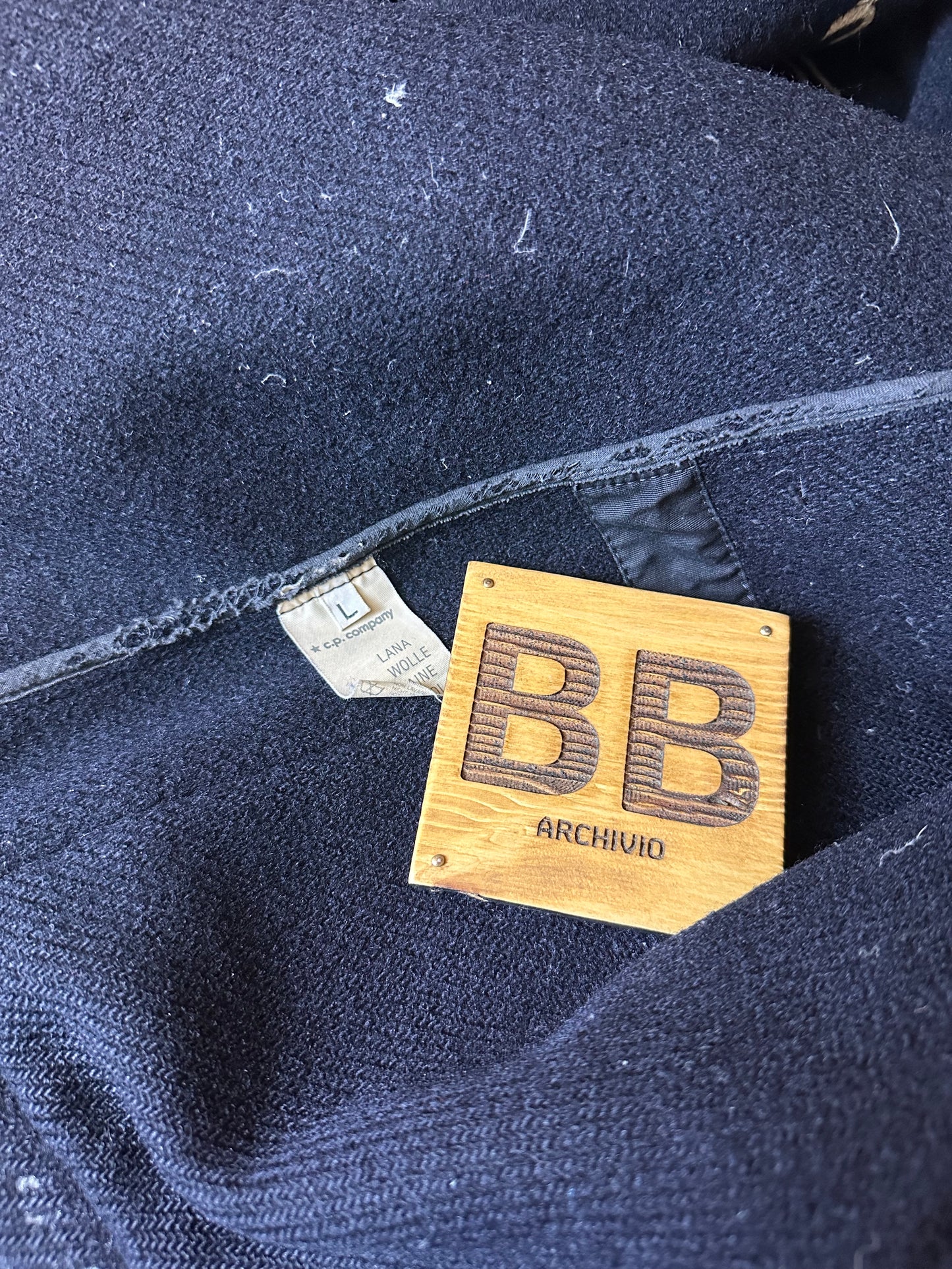 AW88 WOOL MONTGOMERY WITH SPELLOUT in Navy Blue