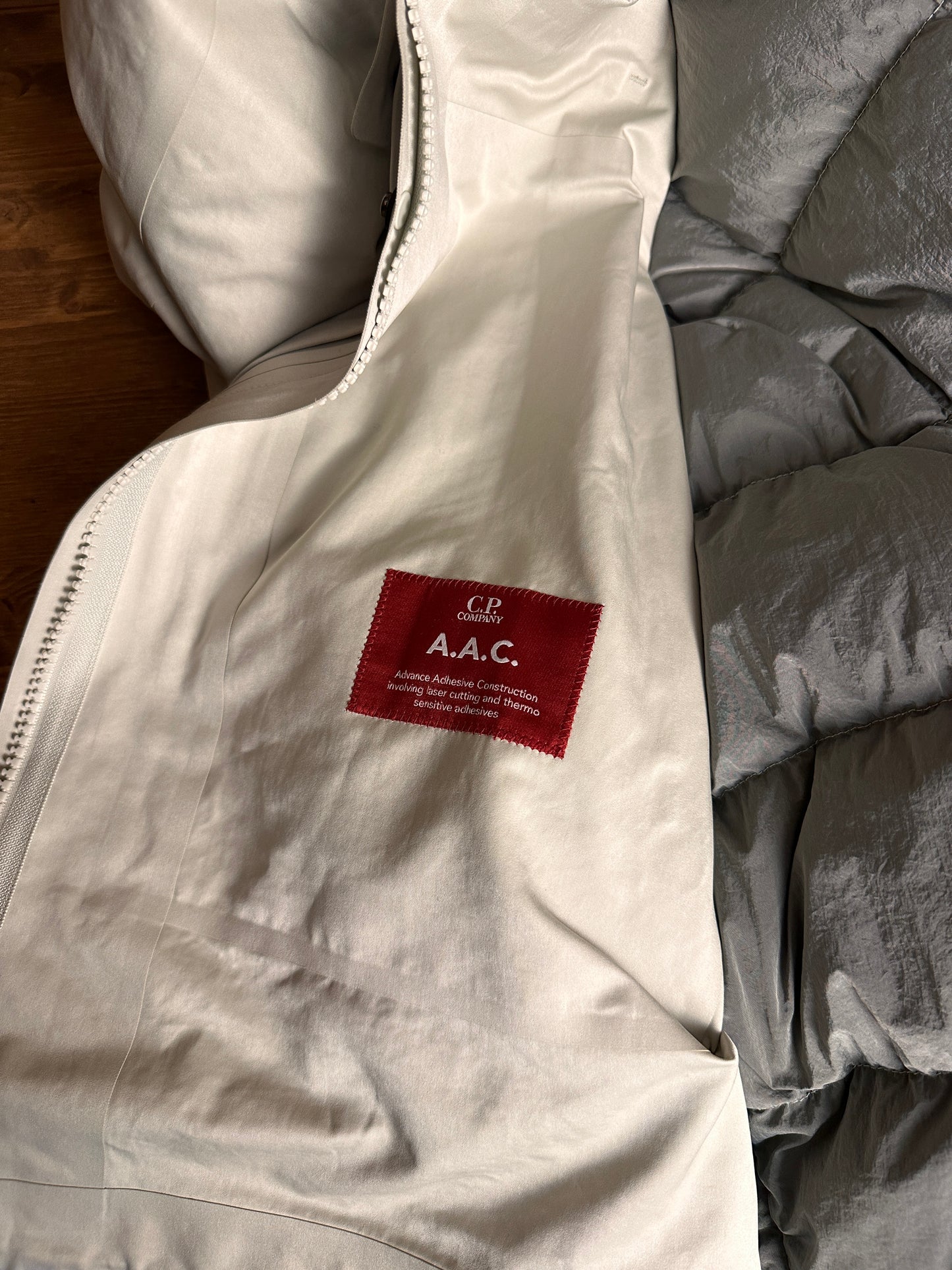 AW20s C.P. COMPANY A.A.C. DOWN JACKET in Oyster White