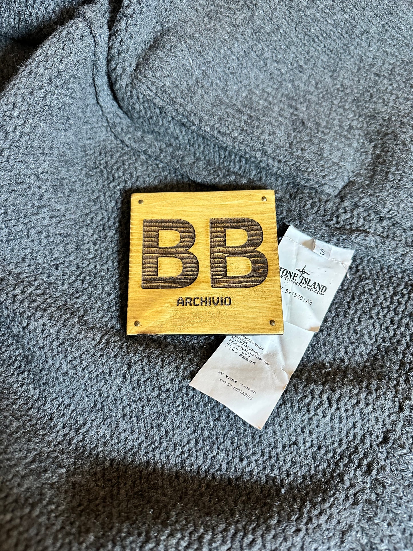 AW13 GREY WOOL ZIP JUMPER with polyamide quilted hood